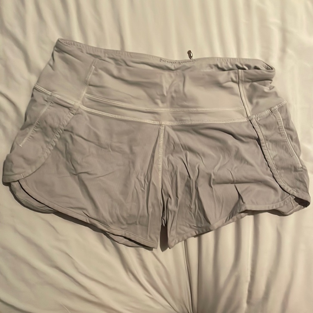 Lululemon 4 inch white stained speed-ups.